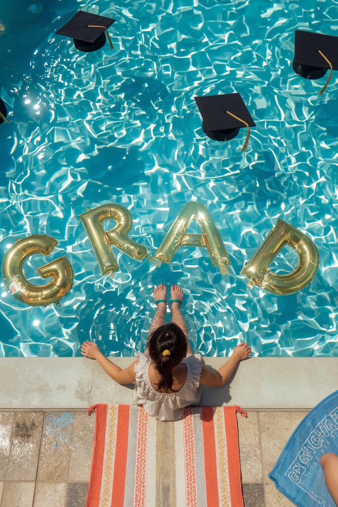 Pool Party with Floating Grad Caps
