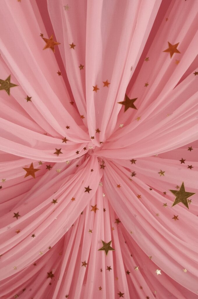 Pink Tulle Ceiling Drapes with Golden Stars